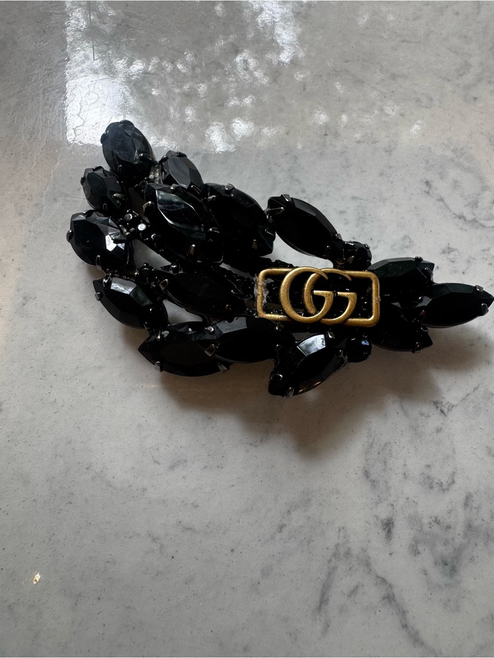 Vintage brooch with GG accent